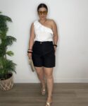 top algodón asimétrico con volante moda mujer verano 2025