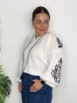 falda midi mujer abertura central moda tendencias otoño 2025